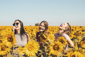 Teenage girls wearing Noz sunscreen enjoying a sunny day